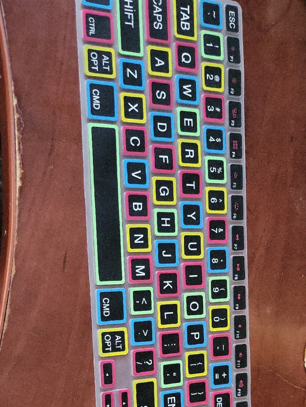 silicone keyboard cover for MacBook Pro and Air features a black layout with lar